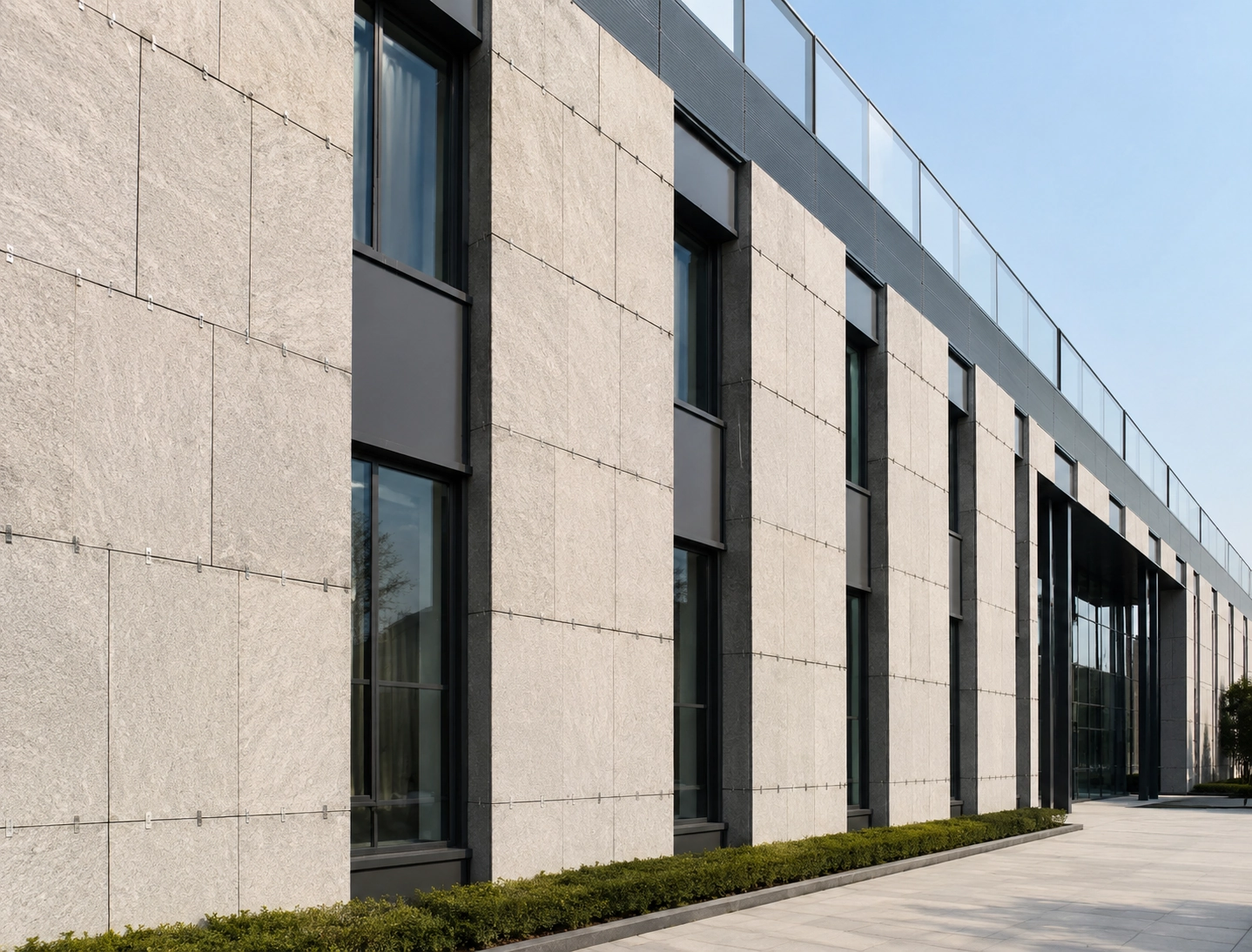 Exterior stone facade application using support rail fixing system